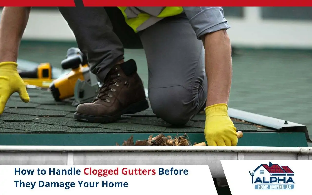 Technician removing leaves from a clogged gutter on a home in Elizabeth, NJ